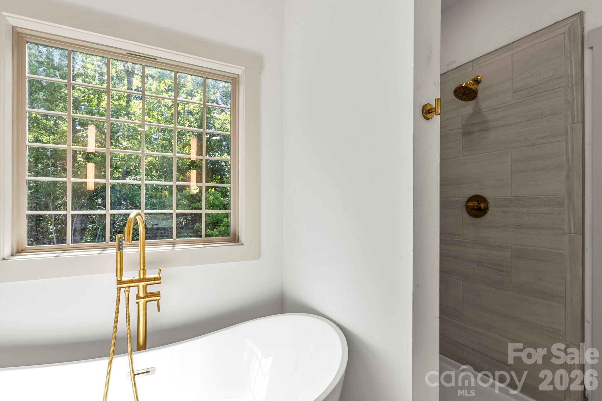 1167 Tirzah Road Rock Hill, SC 29732 - Photo 14 of 25 a bathroom with a sink and a window