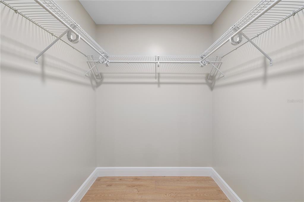 20045 Southwest 88th Place Road Dunnellon, FL 34431 - Photo 24 of 53 a view of a room with racks on the wall