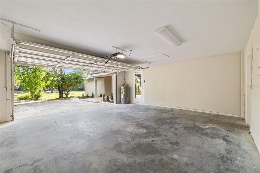20045 Southwest 88th Place Road Dunnellon, FL 34431 - Photo 34 of 53 a view of a room with windows and ceiling fan