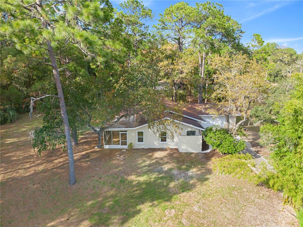 20045 Southwest 88th Place Road Dunnellon, FL 34431 - Photo 35 of 53 a house view with a yard