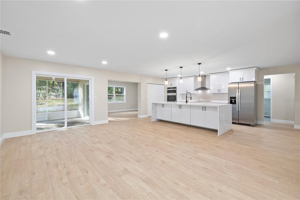 20045 Southwest 88th Place Road Dunnellon, FL 34431 - Photo 7 of 53 a view of a kitchen with a sink and a window