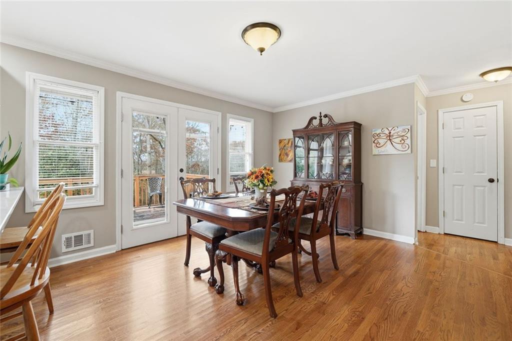 438 Mountainview Circle Canton, GA 30115 - Photo 12 of 41 a view of a dining room with furniture window and wooden floor