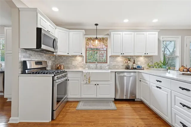 a view of kitchen with furniture and window