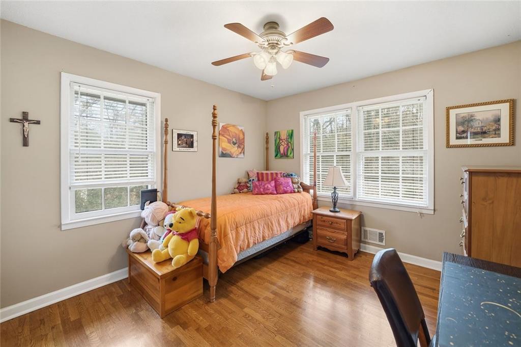 438 Mountainview Circle Canton, GA 30115 - Photo 19 of 41 a bedroom with bed and window