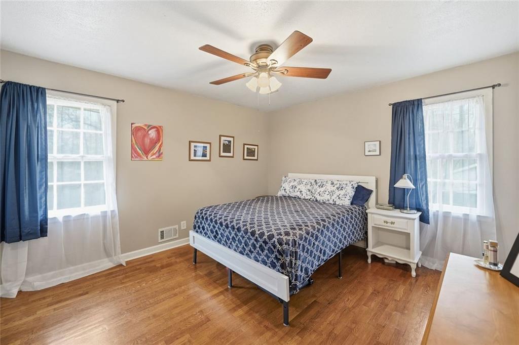 438 Mountainview Circle Canton, GA 30115 - Photo 20 of 41 a bedroom with a bed and a window