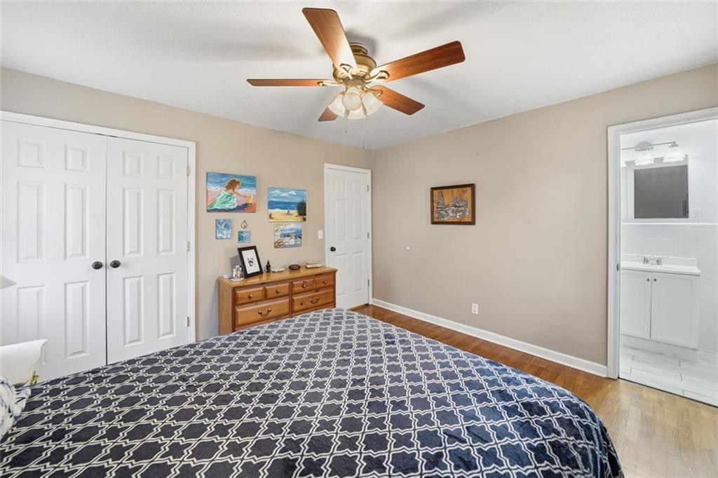 438 Mountainview Circle Canton, GA 30115 - Photo 22 of 41 a bedroom with a bed and a table
