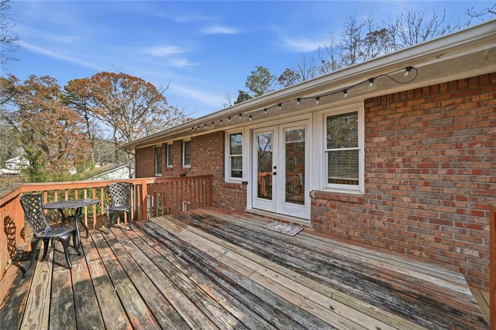 438 Mountainview Circle Canton, GA 30115 - Photo 28 of 41 a view of a house with a large window and wooden floor