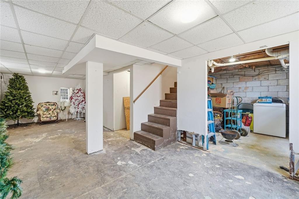 438 Mountainview Circle Canton, GA 30115 - Photo 33 of 41 a view of a livingroom with entryway and stairs