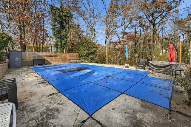 a picture of a bathroom with a shower