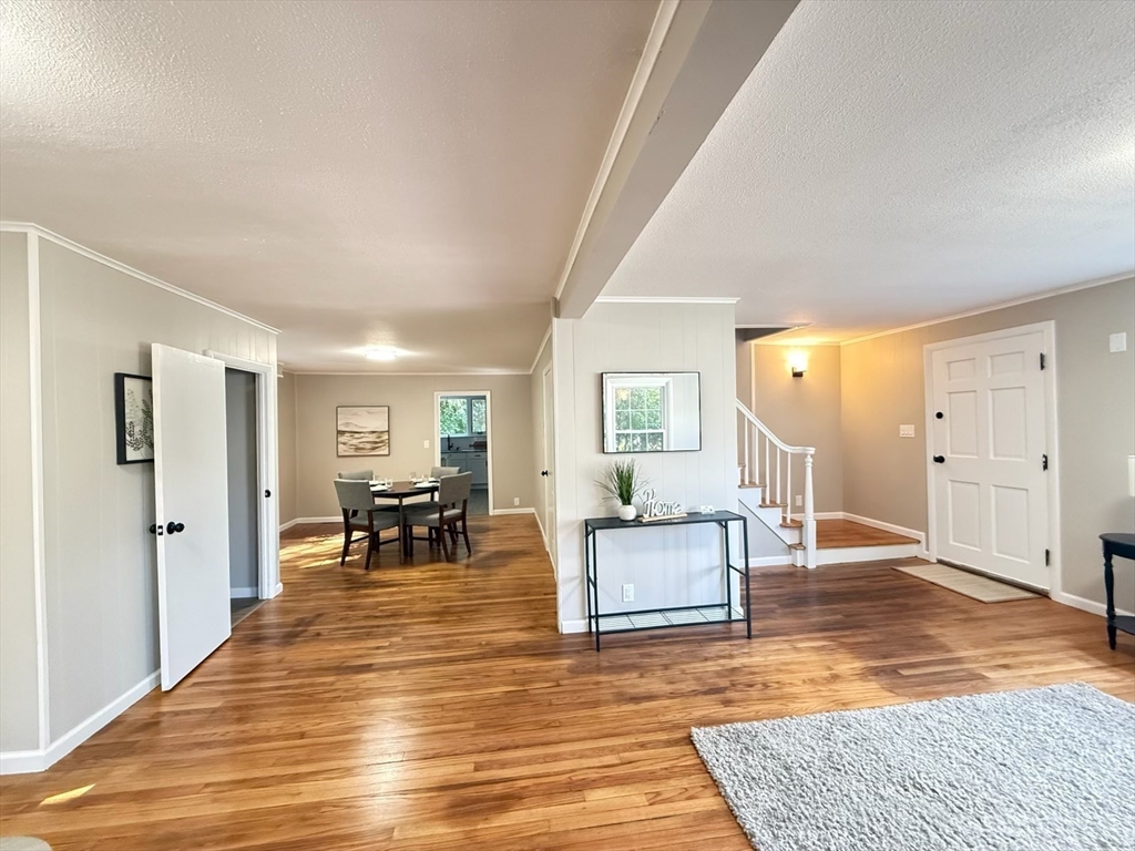 37 Bridge Street Monson, MA 01057 - Photo 7 of 35 a living room with furniture and a table