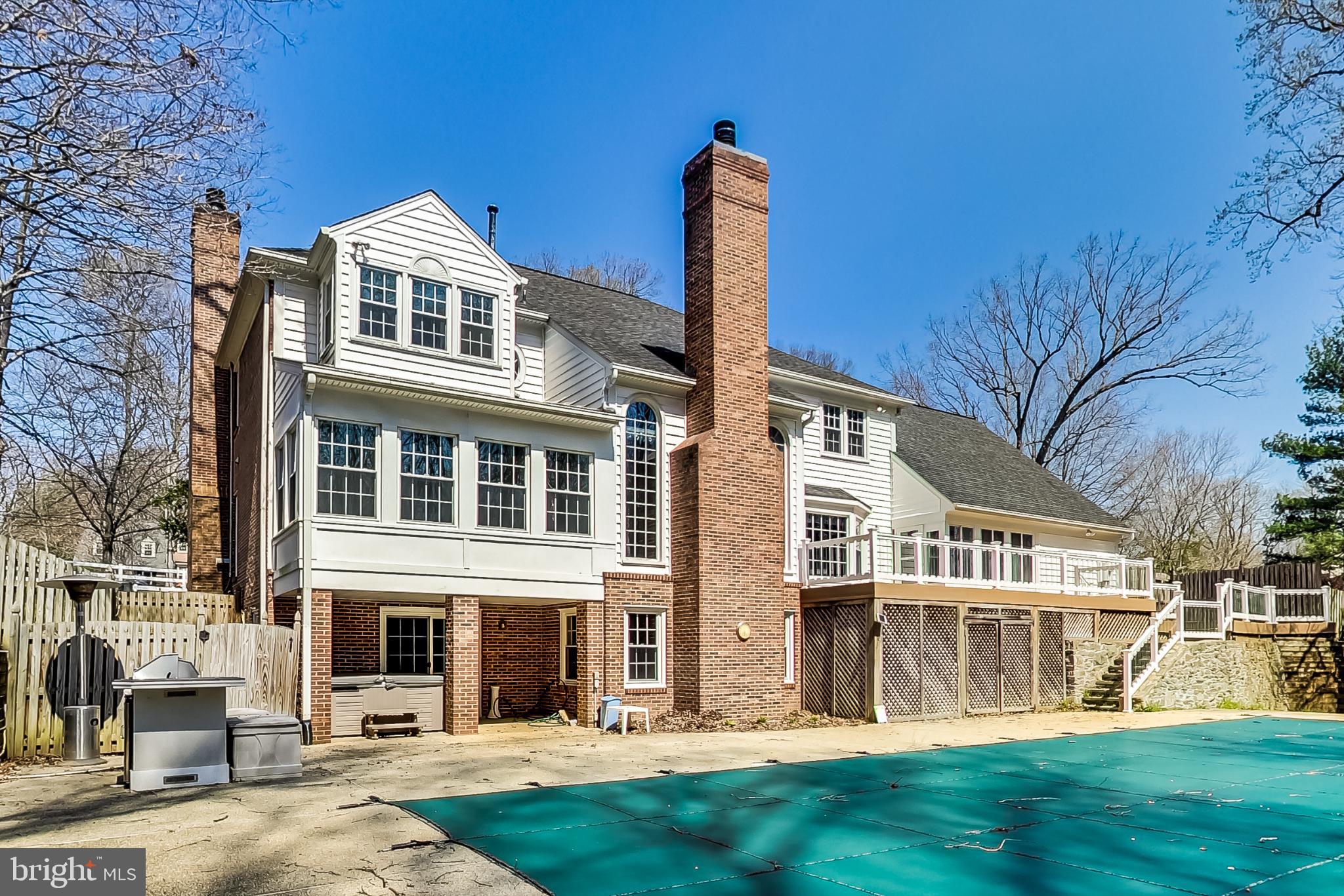 12009 Wetherfield Lane Potomac, MD 20854 - Photo 62 of 86 Rear of house with pool an deck