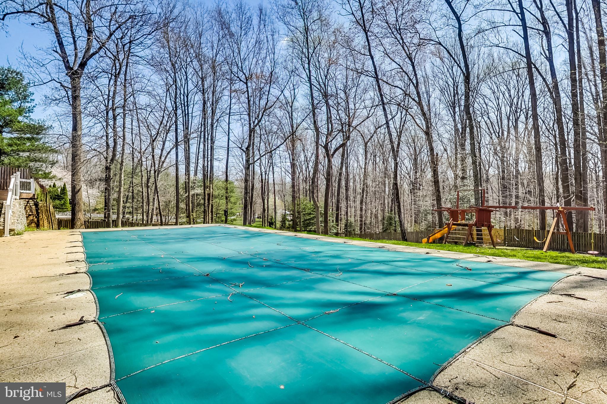 12009 Wetherfield Lane Potomac, MD 20854 - Photo 71 of 86 Gas heated pool with electric retractable cover