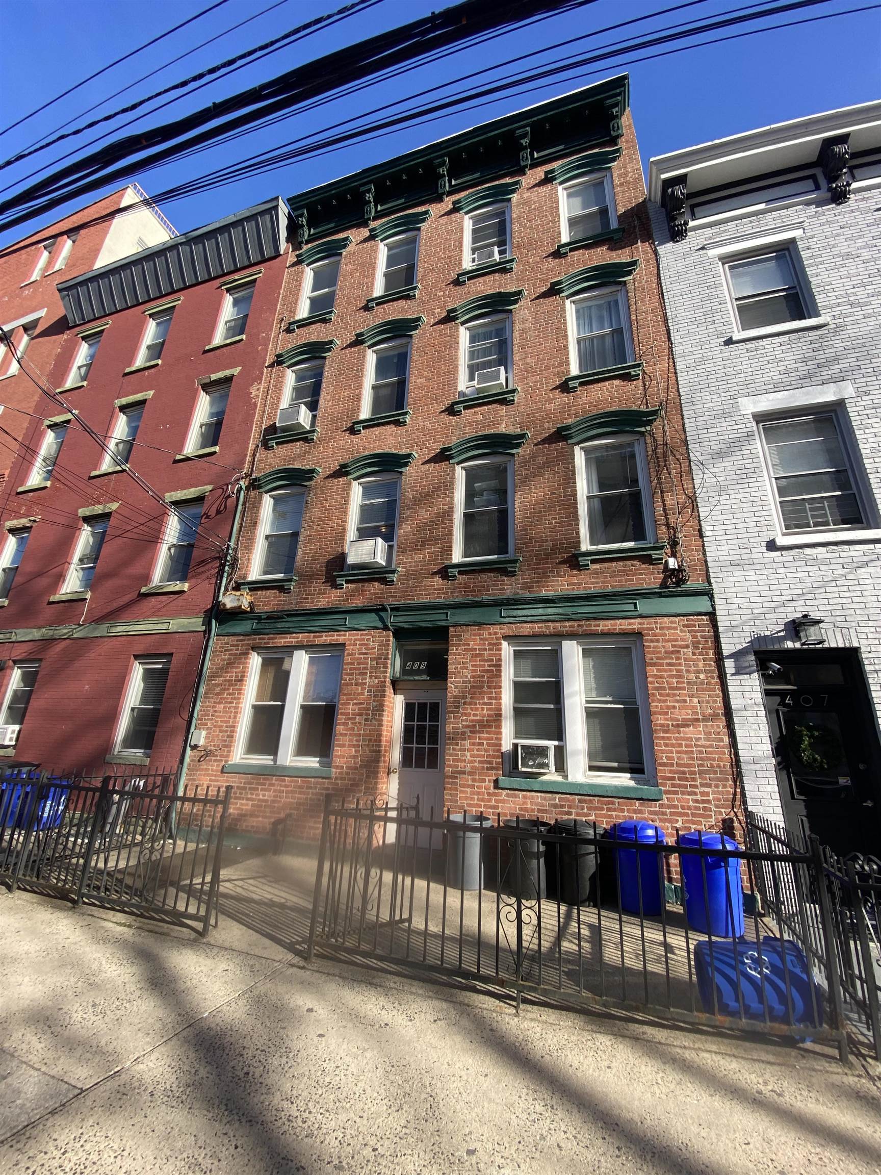 409 Bloomfield Street, Unit 8 Hoboken, NJ 07030 - Photo 5 of 5 a view of a building with many windows