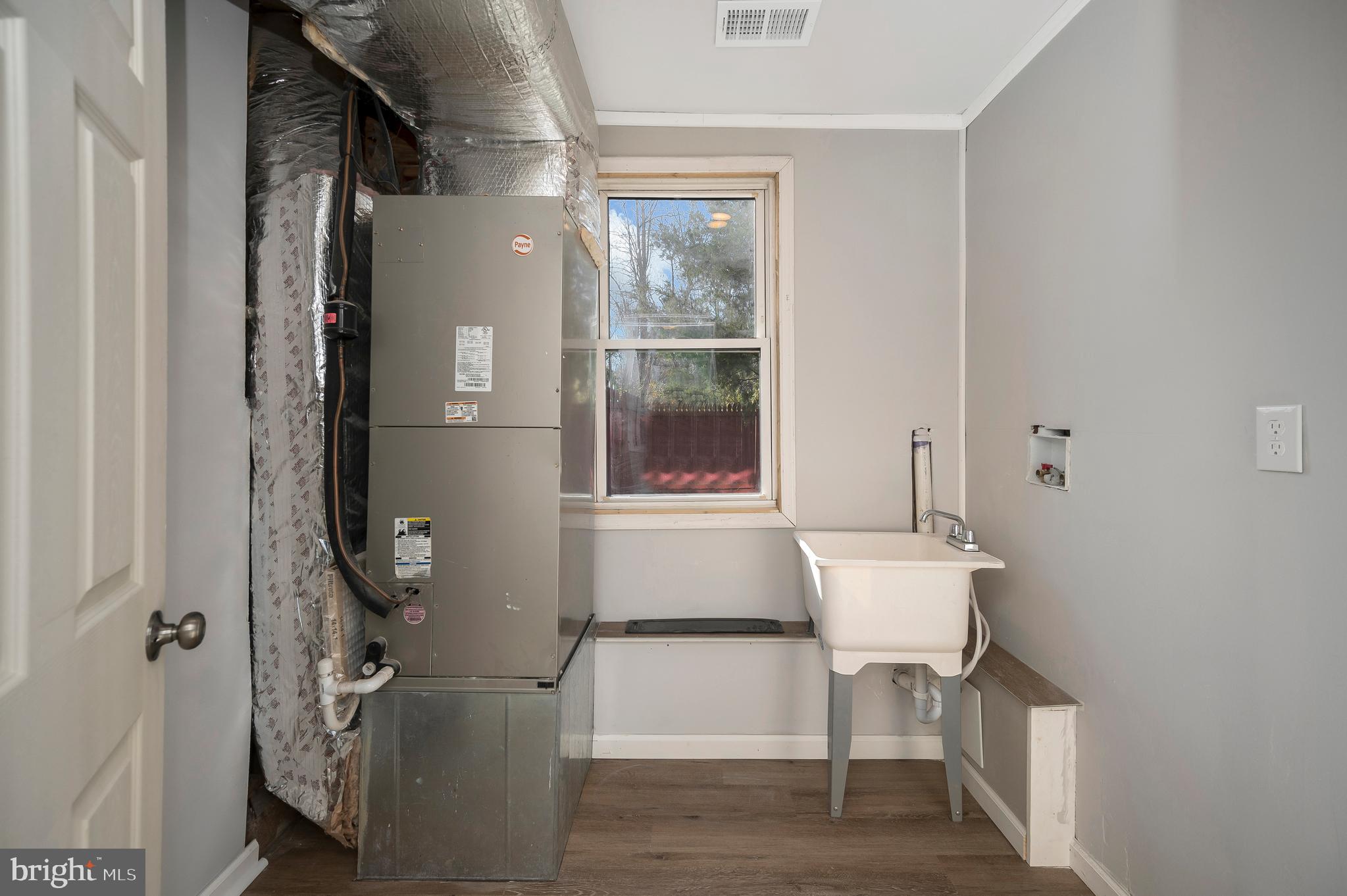 26348 Sunshine Road Ruther Glen, VA 22546 - Photo 27 of 56 a room with a table and chairs