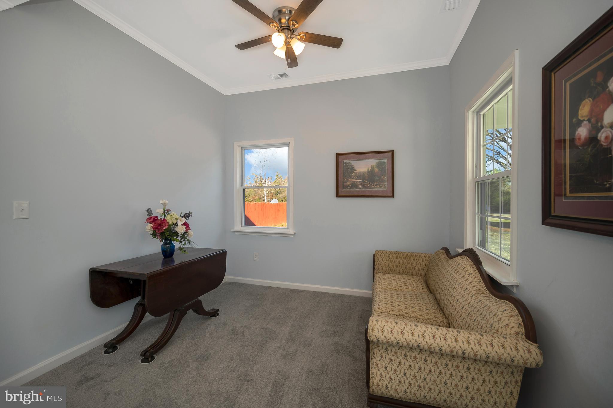 26348 Sunshine Road Ruther Glen, VA 22546 - Photo 3 of 56 a living room with furniture and a window