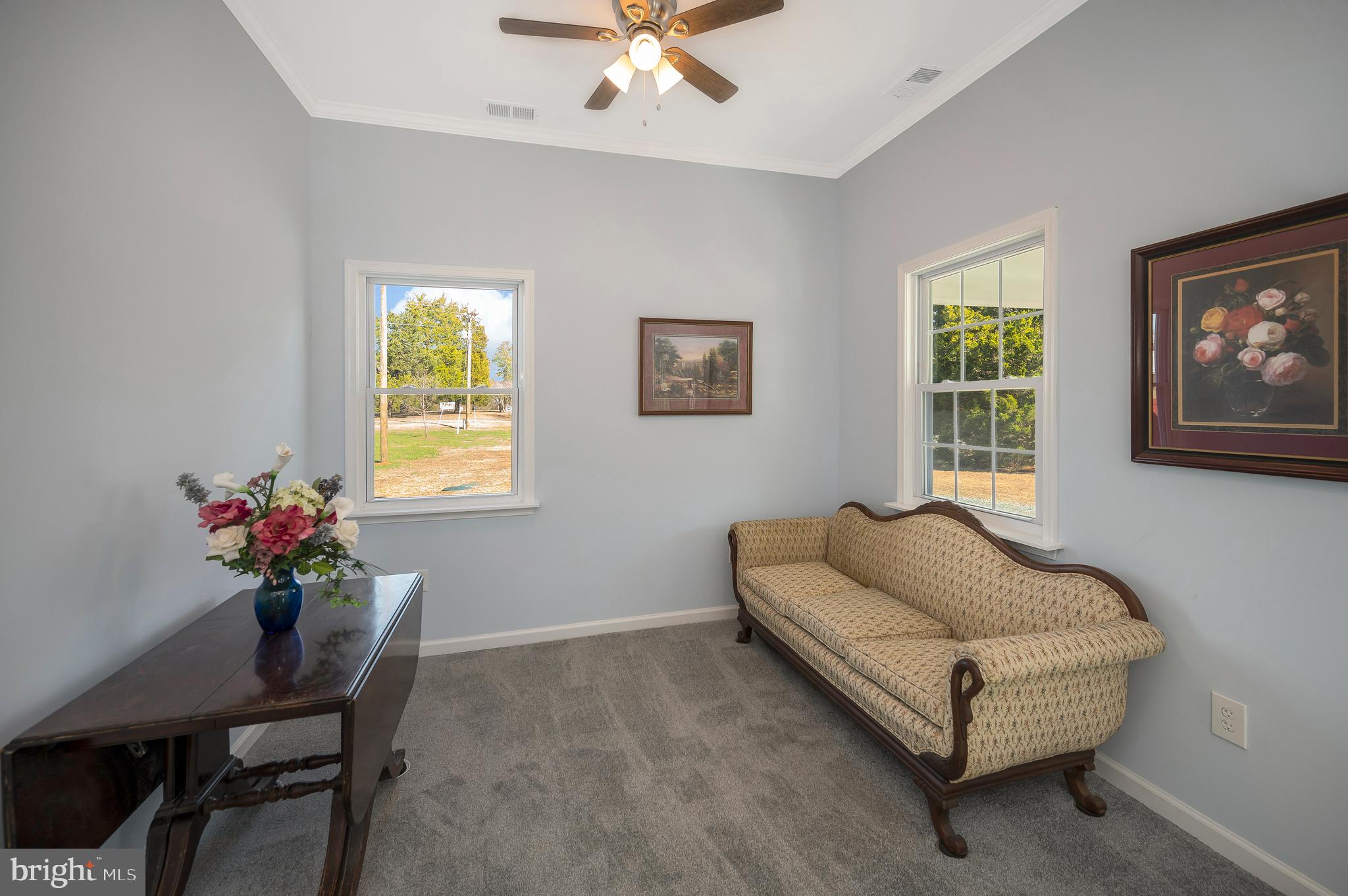 26348 Sunshine Road Ruther Glen, VA 22546 - Photo 4 of 56 a living room with furniture and a window