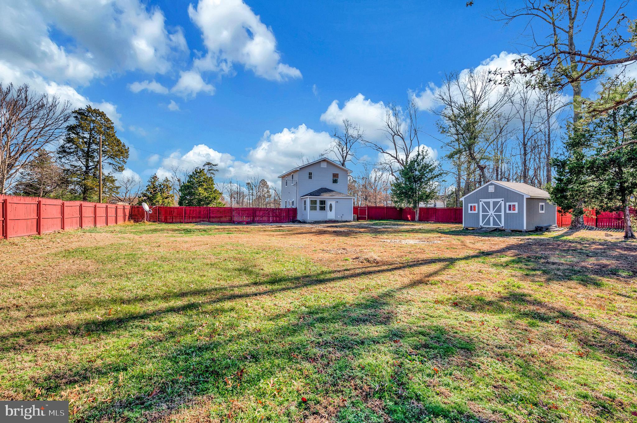 26348 Sunshine Road Ruther Glen, VA 22546 - Photo 41 of 56 a view of swimming pool with an outdoor space and seating area