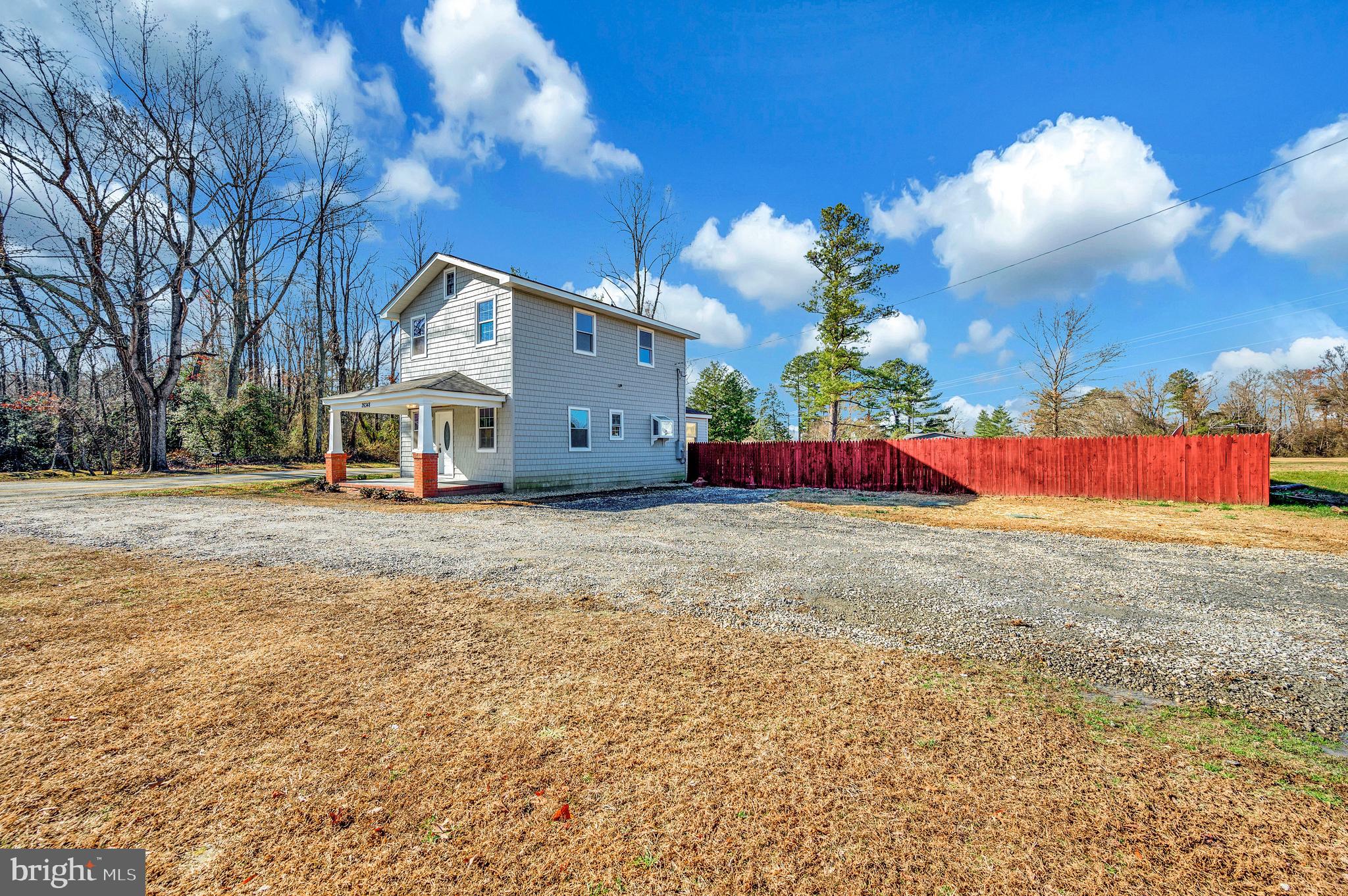 26348 Sunshine Road Ruther Glen, VA 22546 - Photo 49 of 56 a view of a house with a yard