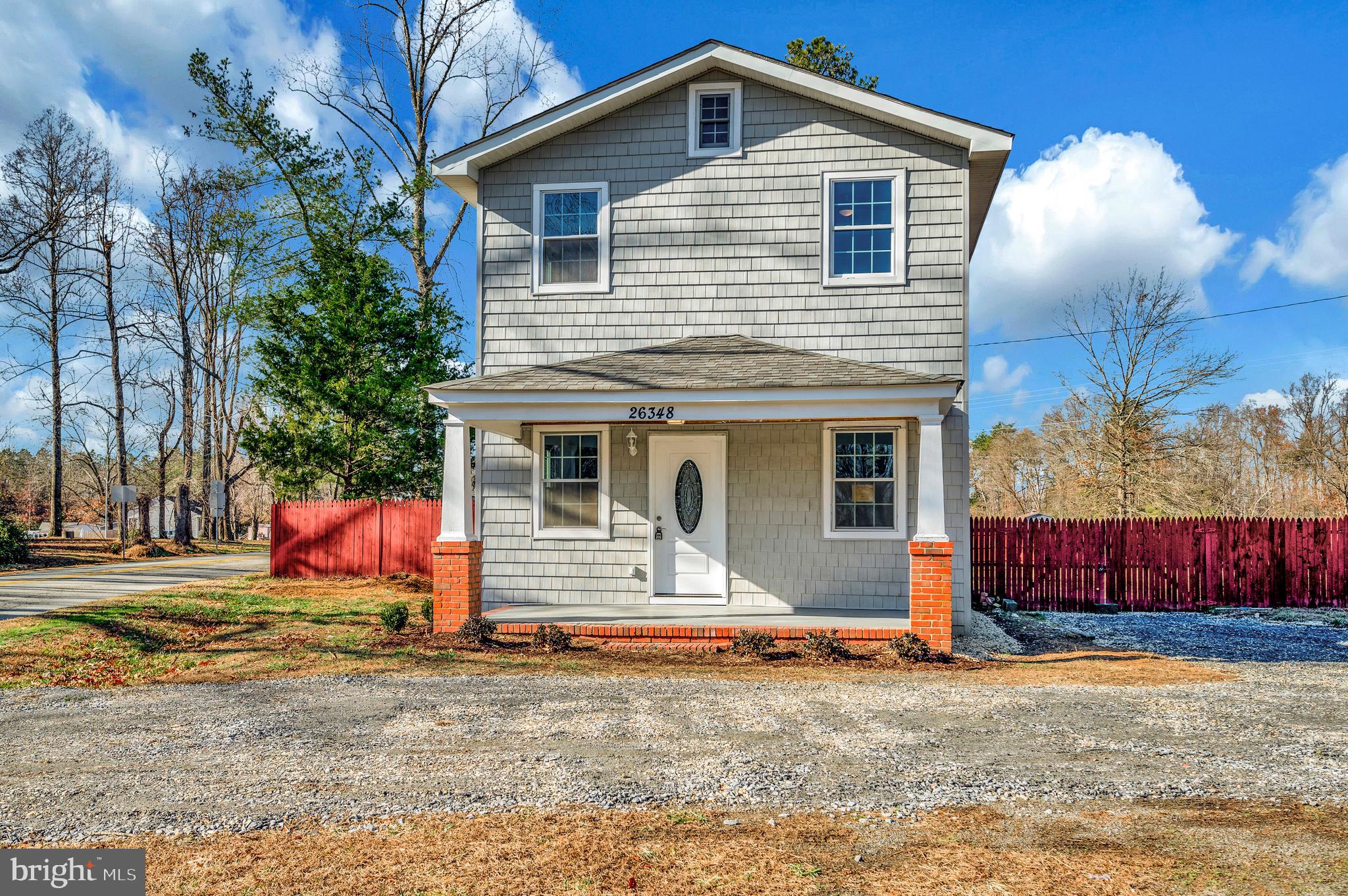 26348 Sunshine Road Ruther Glen, VA 22546 - Photo 51 of 56 a front view of a house with yard