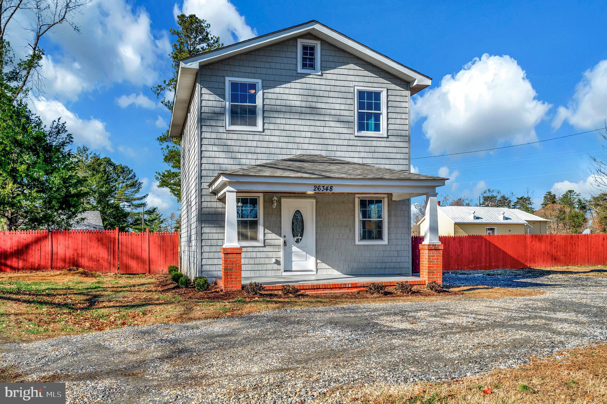 26348 Sunshine Road Ruther Glen, VA 22546 - Photo 52 of 56 a front view of a house with an outdoor space
