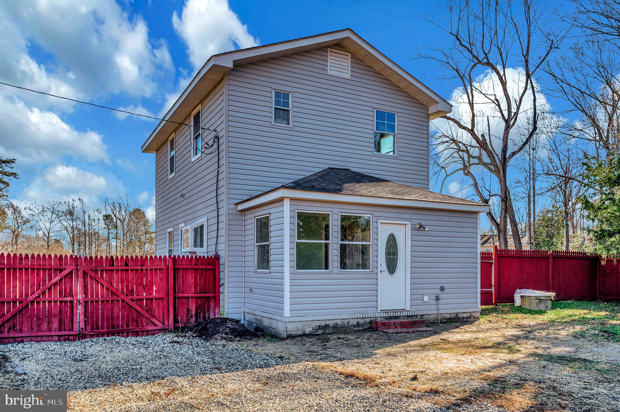 26348 Sunshine Road Ruther Glen, VA 22546 - Photo 56 of 56 a view of a house with a yard