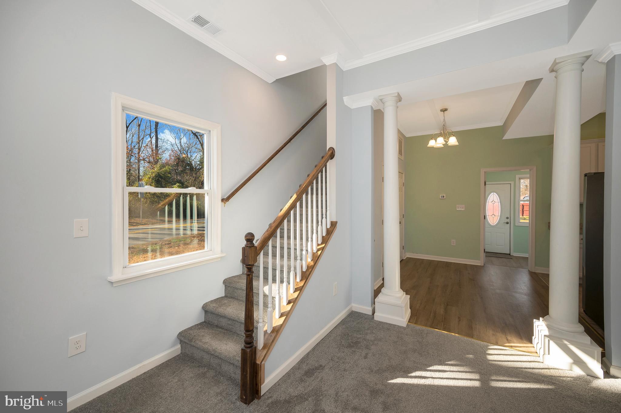 26348 Sunshine Road Ruther Glen, VA 22546 - Photo 9 of 56 a view of an entryway with wooden floor