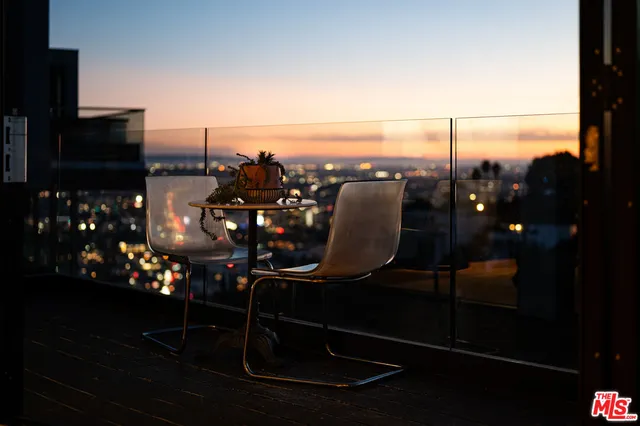 a front view of a building with garden