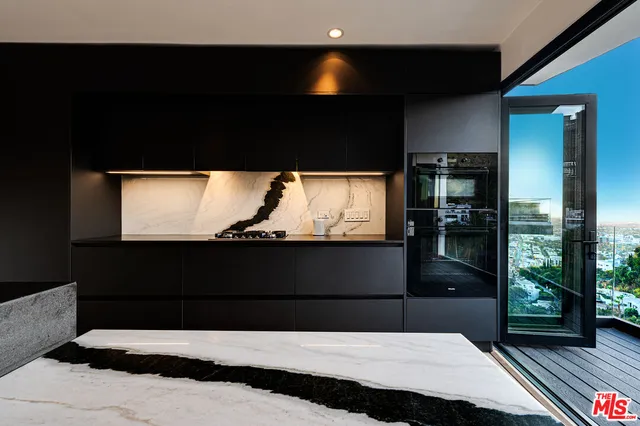 a living room with a flat screen tv