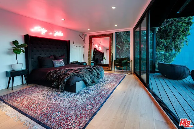 a view of balcony with furniture