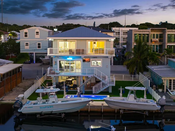 an aerial view of a house with a garden view