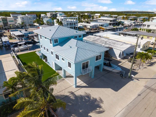 an aerial view of a house with a garden view