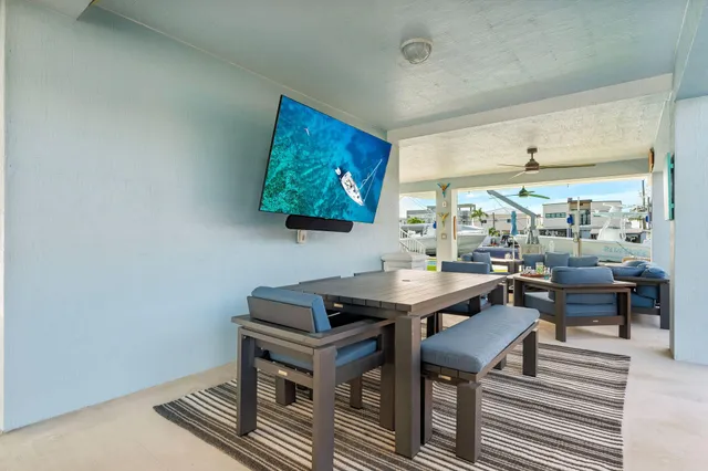 a workspace with furniture and a potted plant