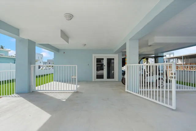 a view of a hallway with a livingroom