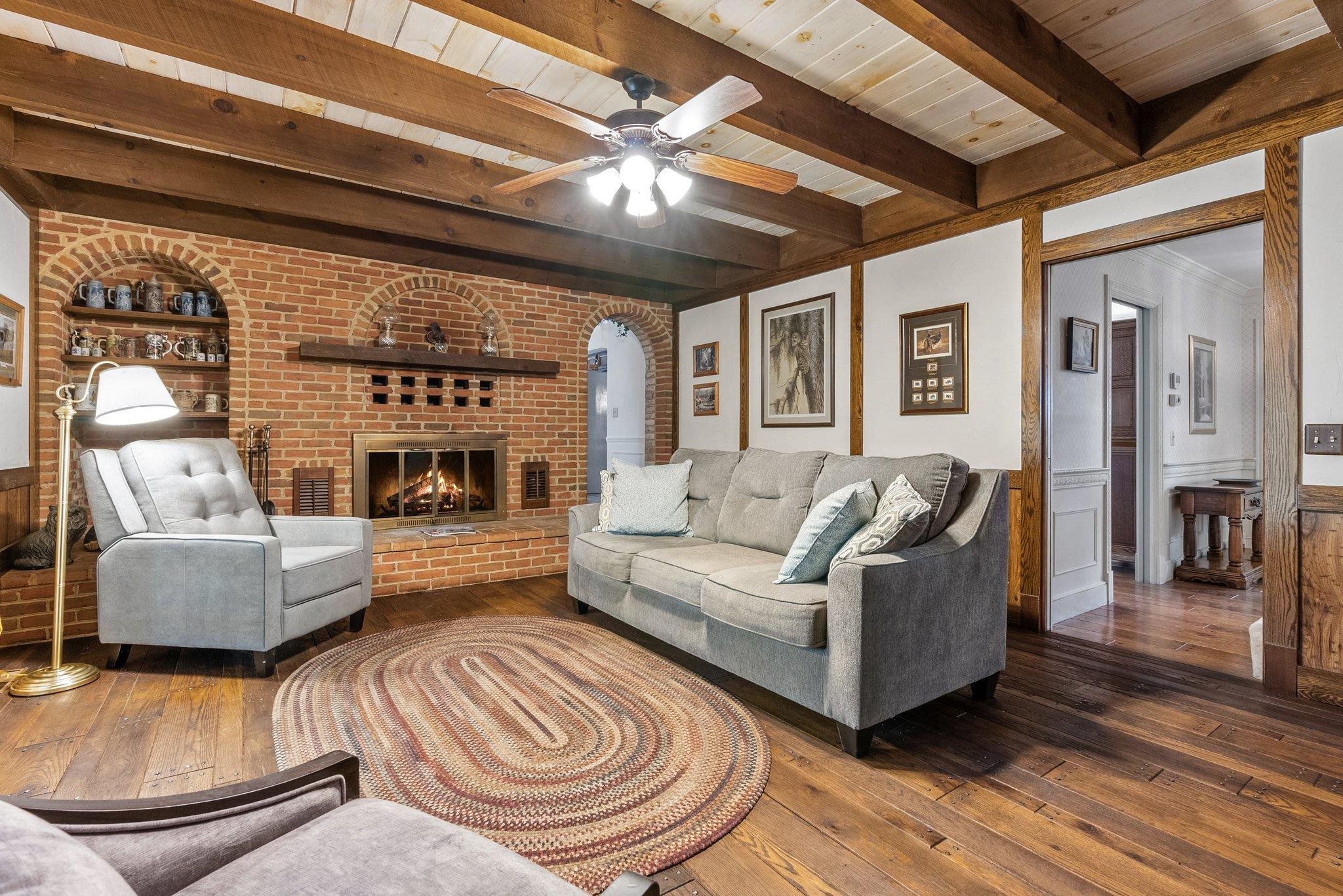 88 Roman Ridge Road Mount Sidney, VA 24467 - Photo 26 of 74 a living room with furniture and a fireplace