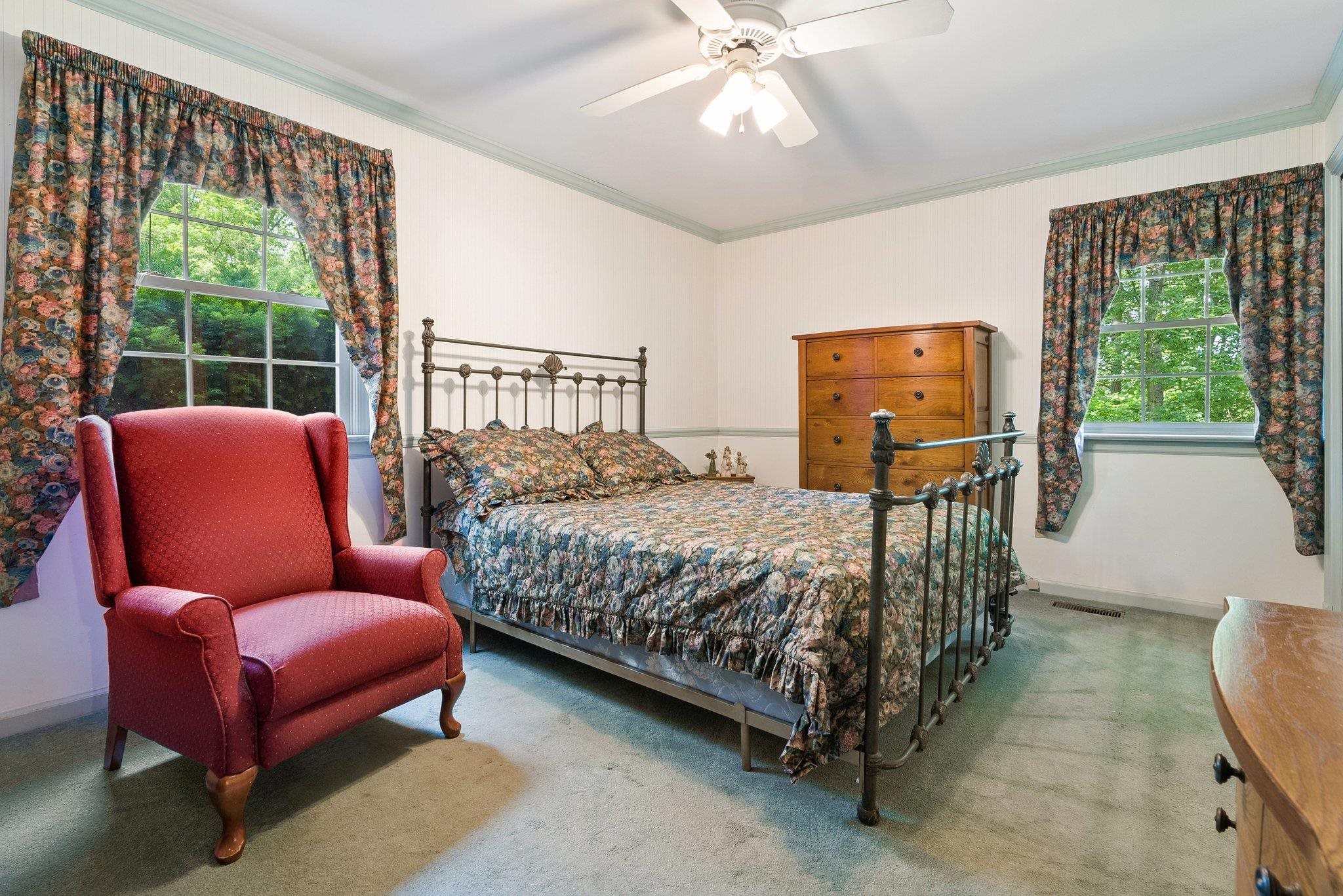 88 Roman Ridge Road Mount Sidney, VA 24467 - Photo 29 of 74 a bedroom with furniture and a large window
