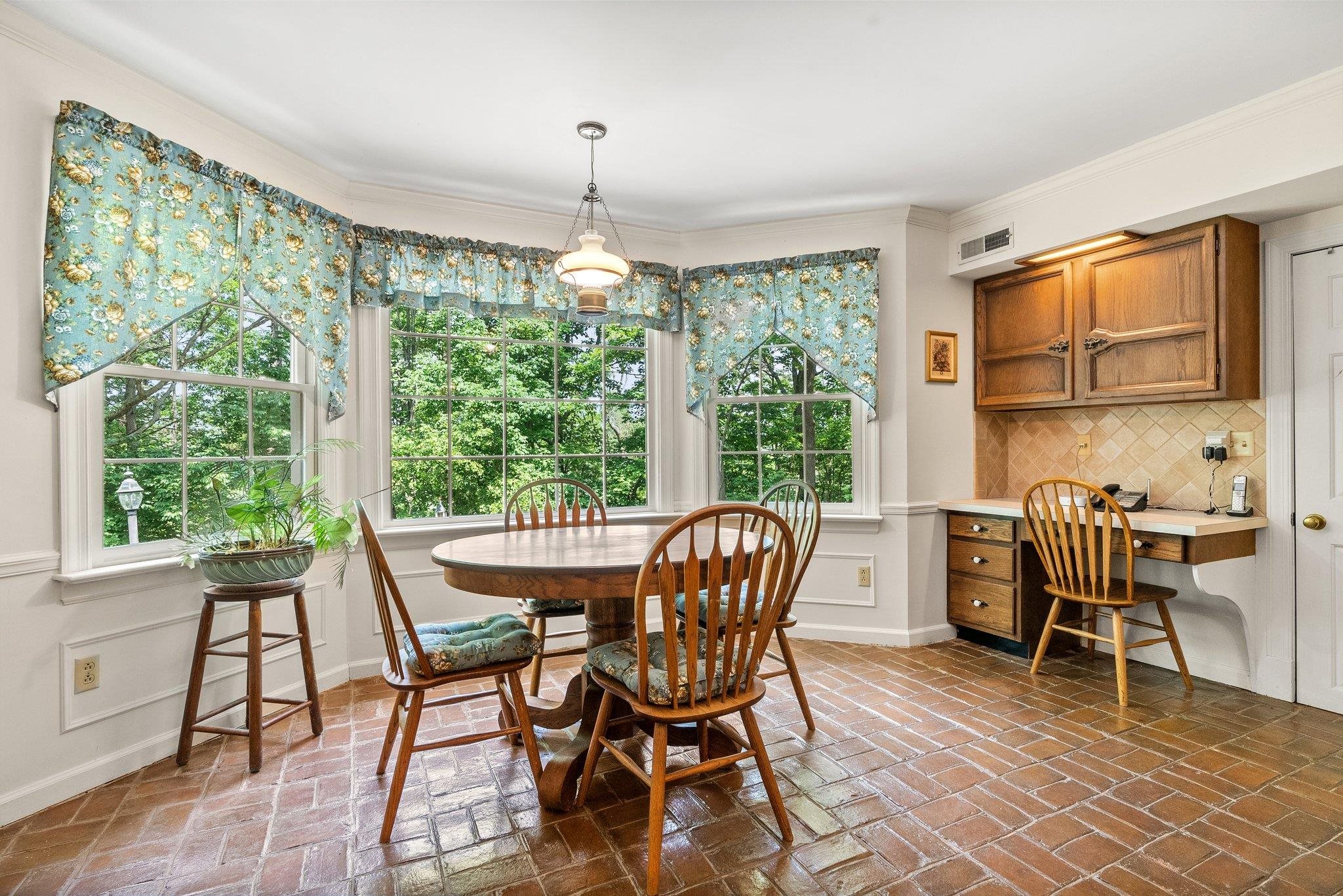 88 Roman Ridge Road Mount Sidney, VA 24467 - Photo 36 of 74 a dining room with furniture a chandelier and wooden floor