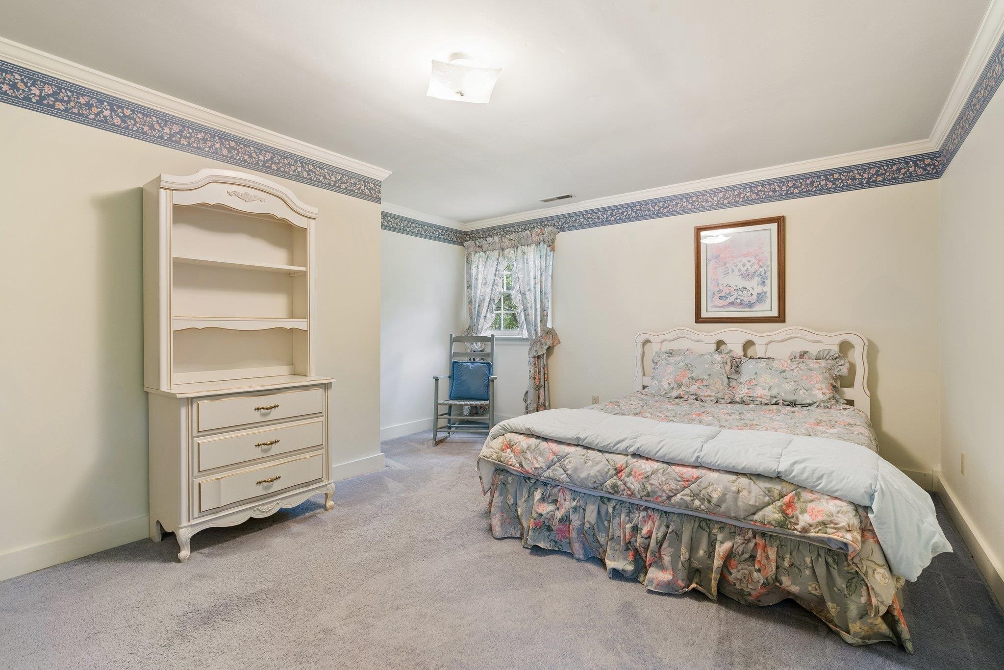 88 Roman Ridge Road Mount Sidney, VA 24467 - Photo 51 of 74 a bedroom with a bed and a window