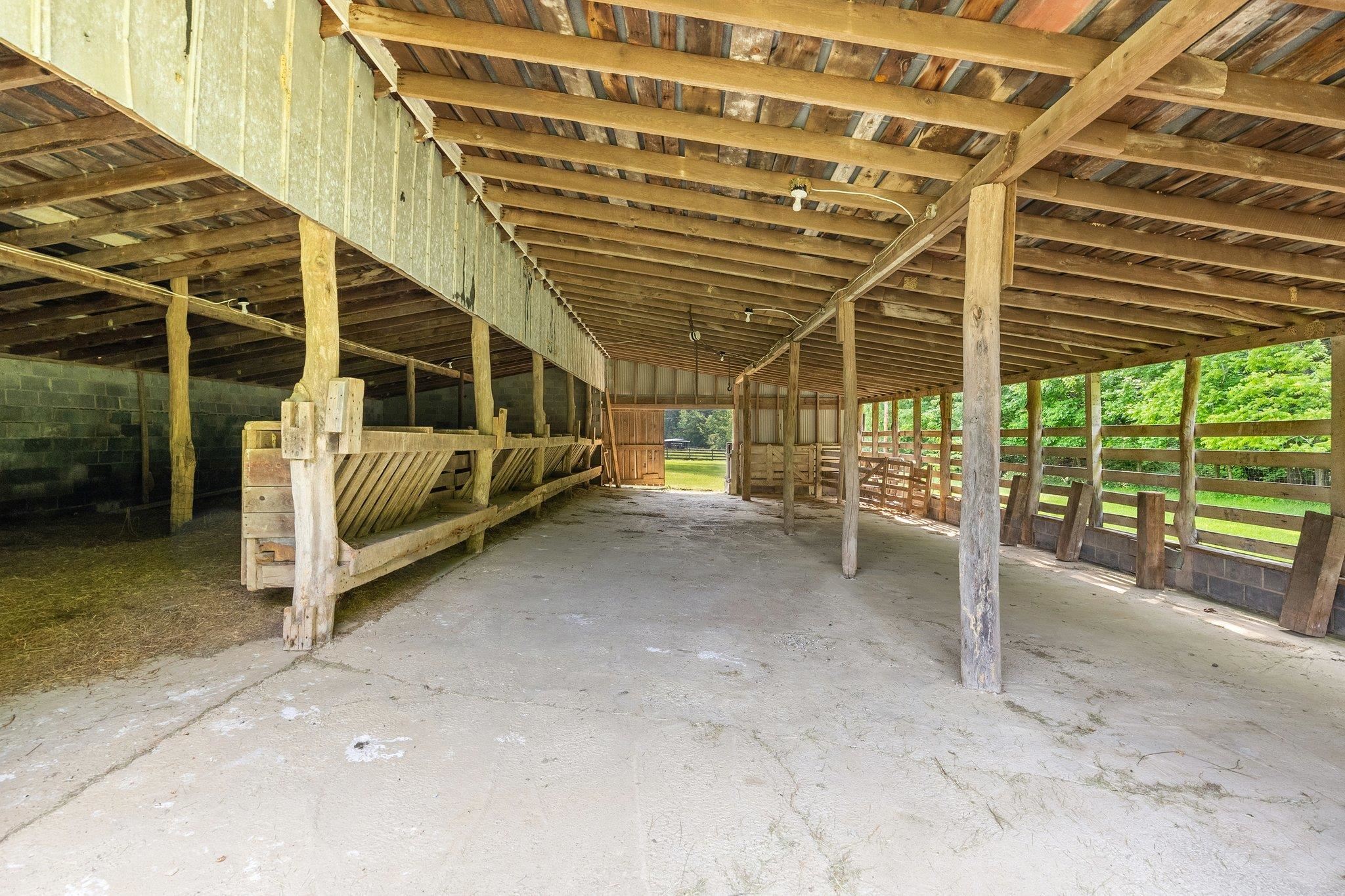88 Roman Ridge Road Mount Sidney, VA 24467 - Photo 72 of 74 a view of a porch with lawn chairs and wooden fence