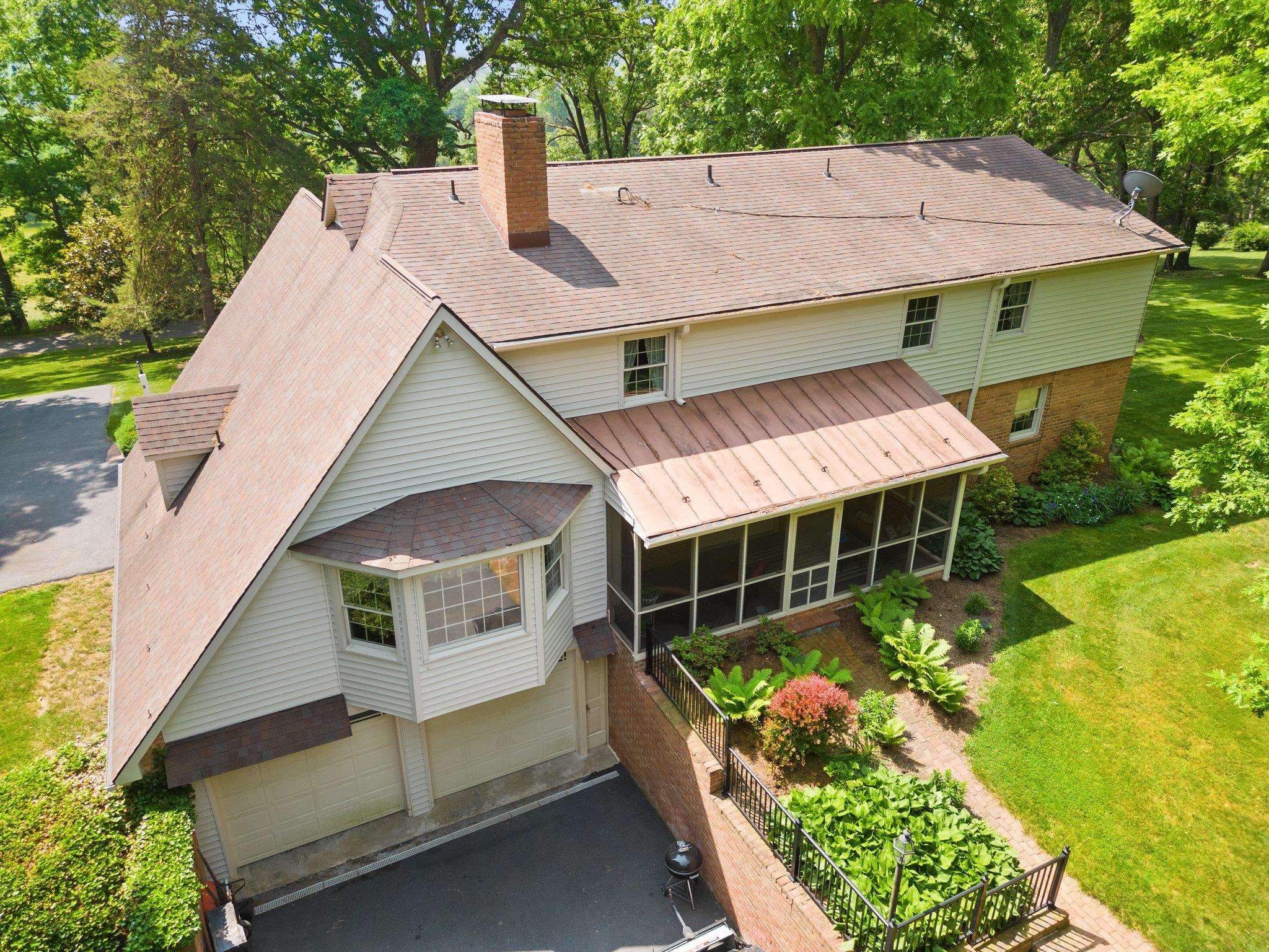 88 Roman Ridge Road Mount Sidney, VA 24467 - Photo 10 of 74 a aerial view of a house with a yard and potted plants