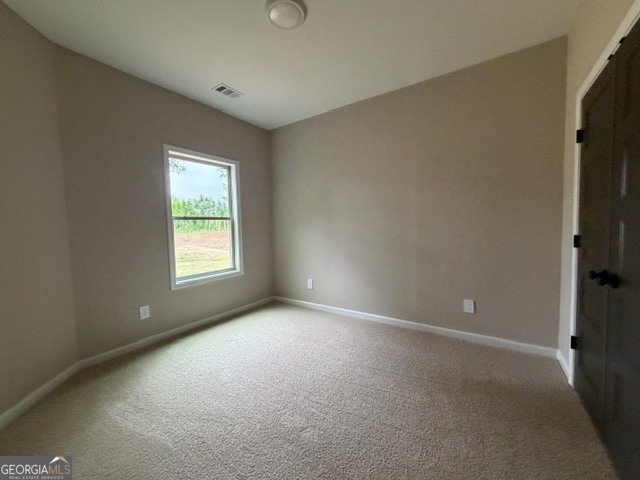 264 Robert Williams Road Greenville, GA 30222 - Photo 17 of 23 an empty room with windows