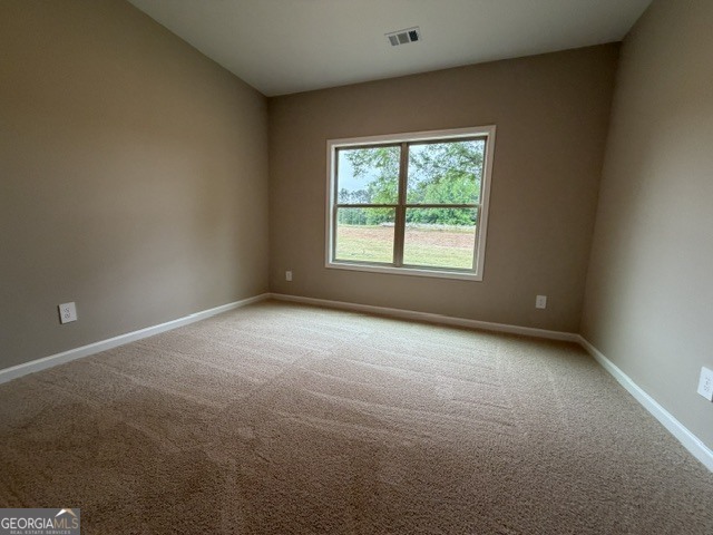 264 Robert Williams Road Greenville, GA 30222 - Photo 19 of 23 an empty room with a window