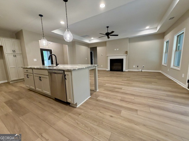 264 Robert Williams Road Greenville, GA 30222 - Photo 4 of 23 a view of a kitchen with a sink a fireplace and wooden floor