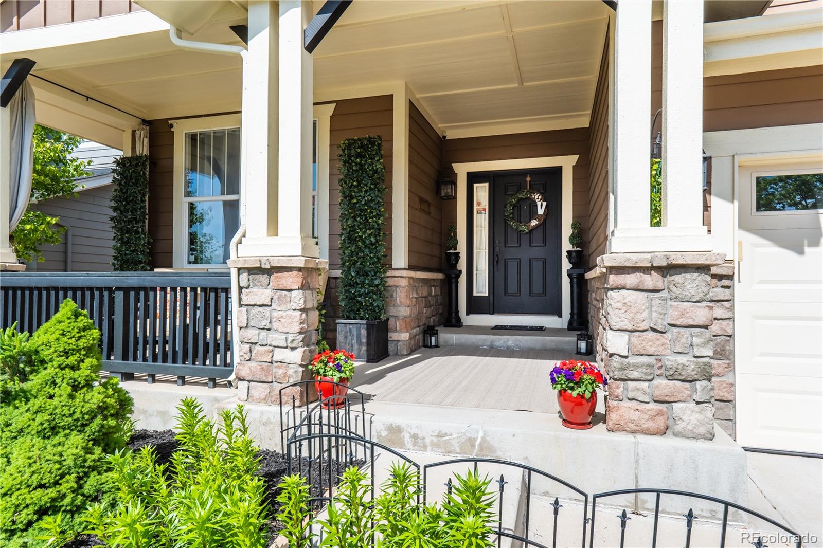 a front view of a house with a porch