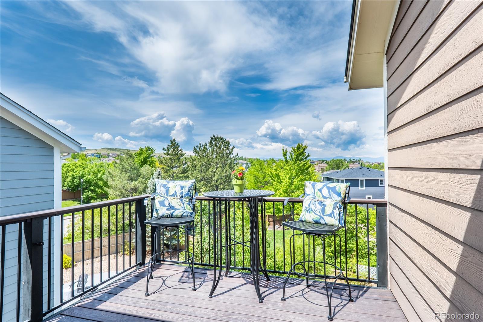 10857 Hickory Ridge Street Highlands Ranch, CO 80126 - Photo 20 of 40 a view of a balcony with chairs