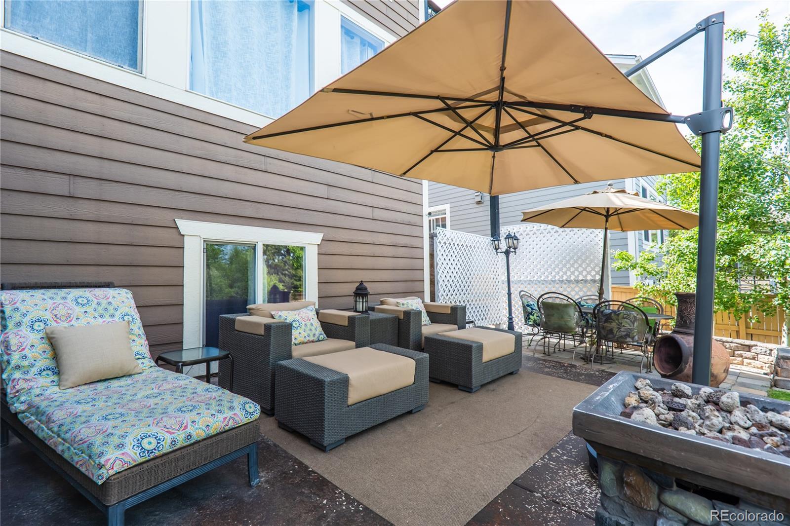 10857 Hickory Ridge Street Highlands Ranch, CO 80126 - Photo 31 of 40 a outdoor space with patio the couches and pool
