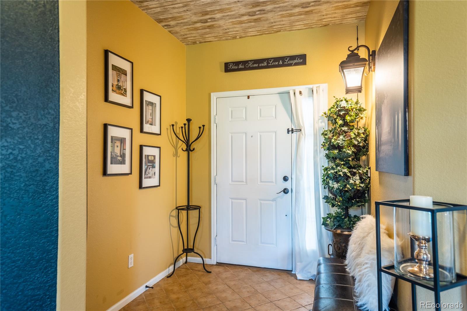 10857 Hickory Ridge Street Highlands Ranch, CO 80126 - Photo 5 of 40 a view of a door with wooden door
