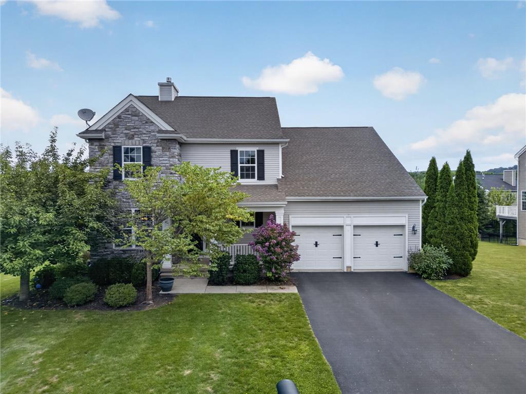 2765 Farmstead Road Easton, PA 18040 - Photo 48 of 50 A classic two-story home features a welcoming covered entry and an attached two-car garage.