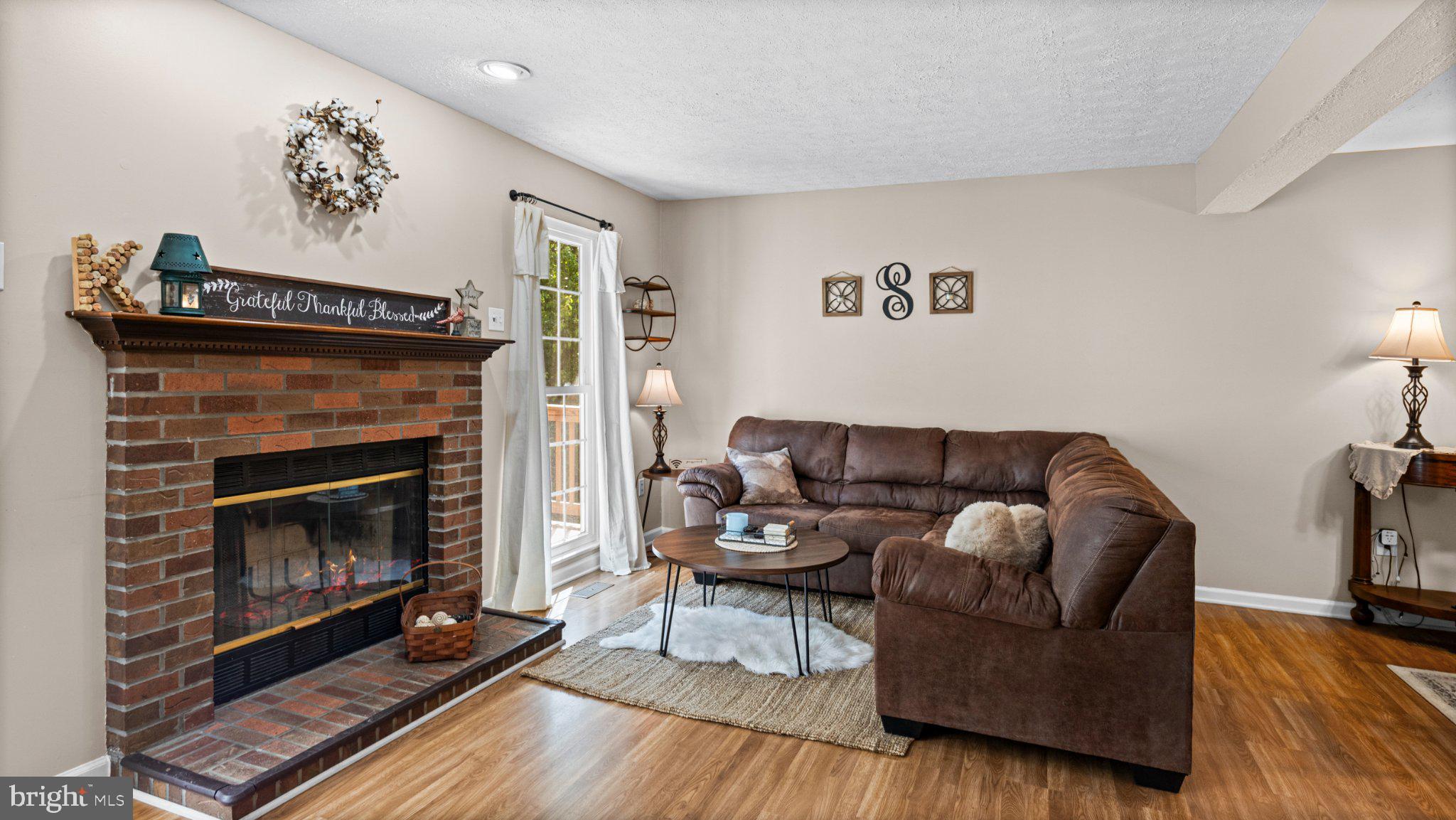 3160 Hidden Ridge Terrace Abingdon, MD 21009 - Photo 10 of 41 Cozy living space with inviting warmth.