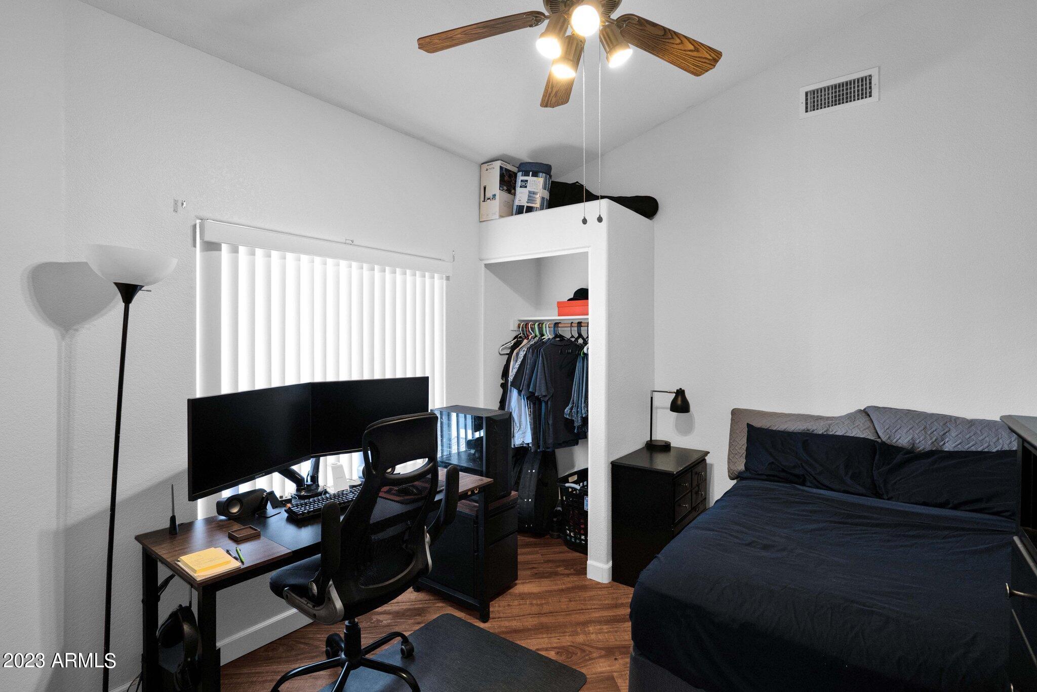 4338 East Douglas Avenue Gilbert, AZ 85234 - Photo 23 of 48 a living room with furniture and a fireplace