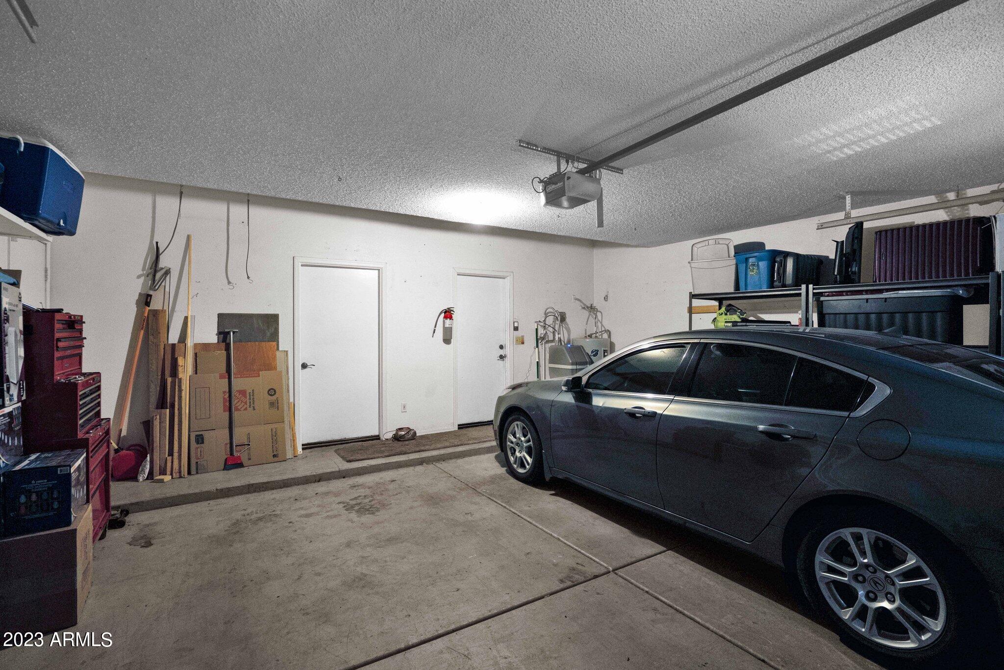 4338 East Douglas Avenue Gilbert, AZ 85234 - Photo 26 of 48 a utility room with sink dryer and washer